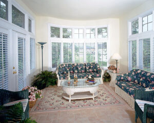 Sunroom with Plantation Shutters by Shenandoah Shutters